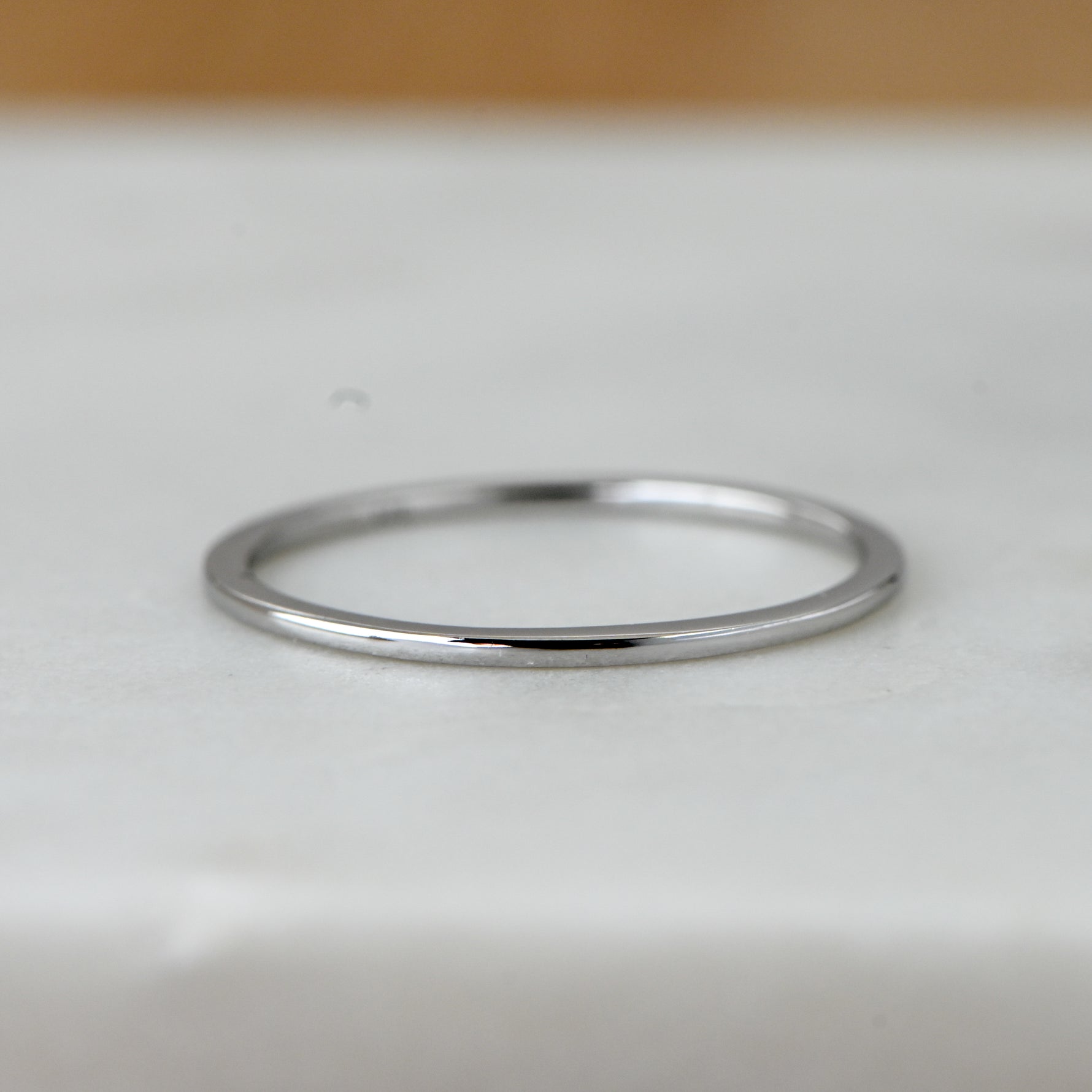 Upclose image of sterling silver plain band.