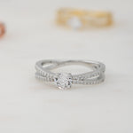 Upclose image of sterling silver double shank diamond ring. 