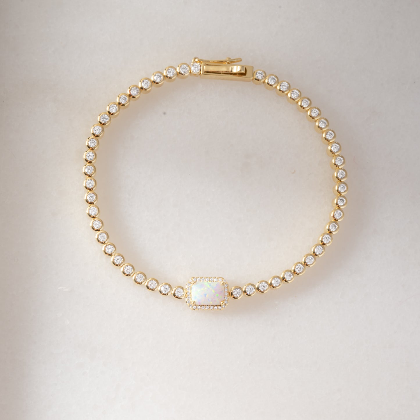 diamond and opal gold tennis bracelet