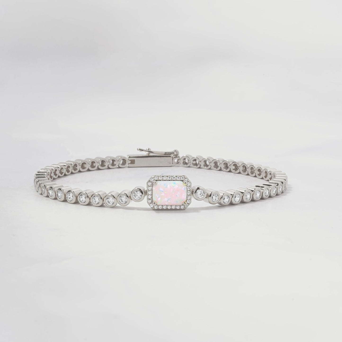 opal baguette charm on silver minimalist tennis bracelet