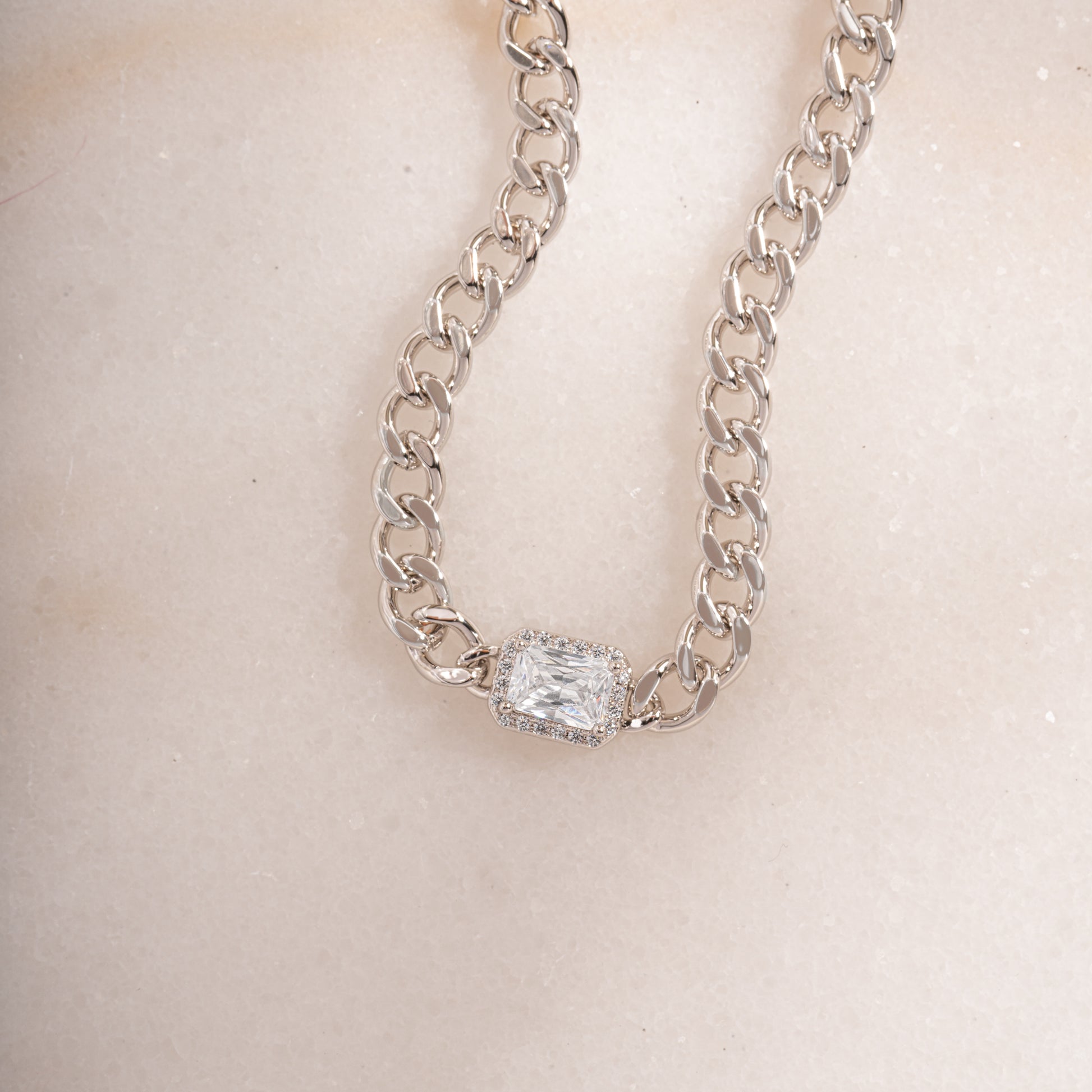 silver statement cuban chain bracelet with halo baguette charm