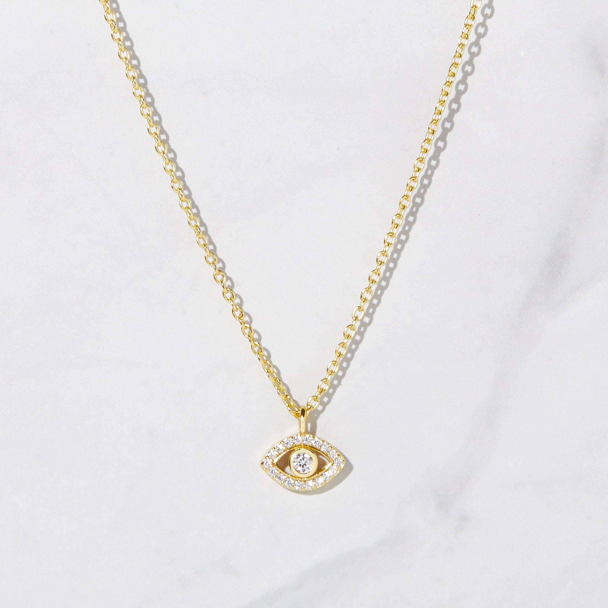 Tiny evil eye on sale necklace