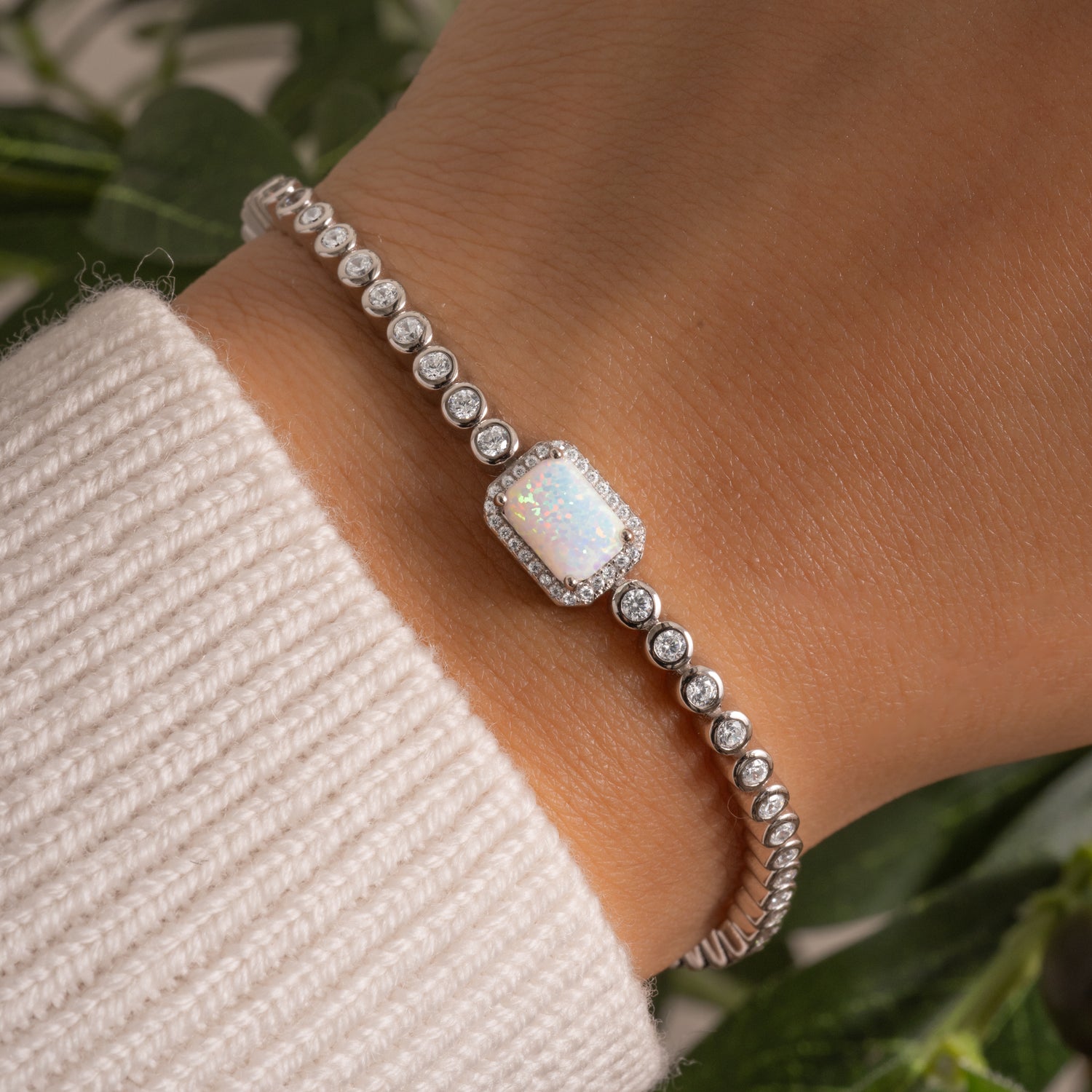 Silver Opal Baguette Tennis Bracelet by Sami Jewels featuring sparkling opal baguette stones on a sleek silver bracelet.