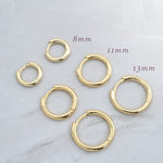 Gold huggie earrings