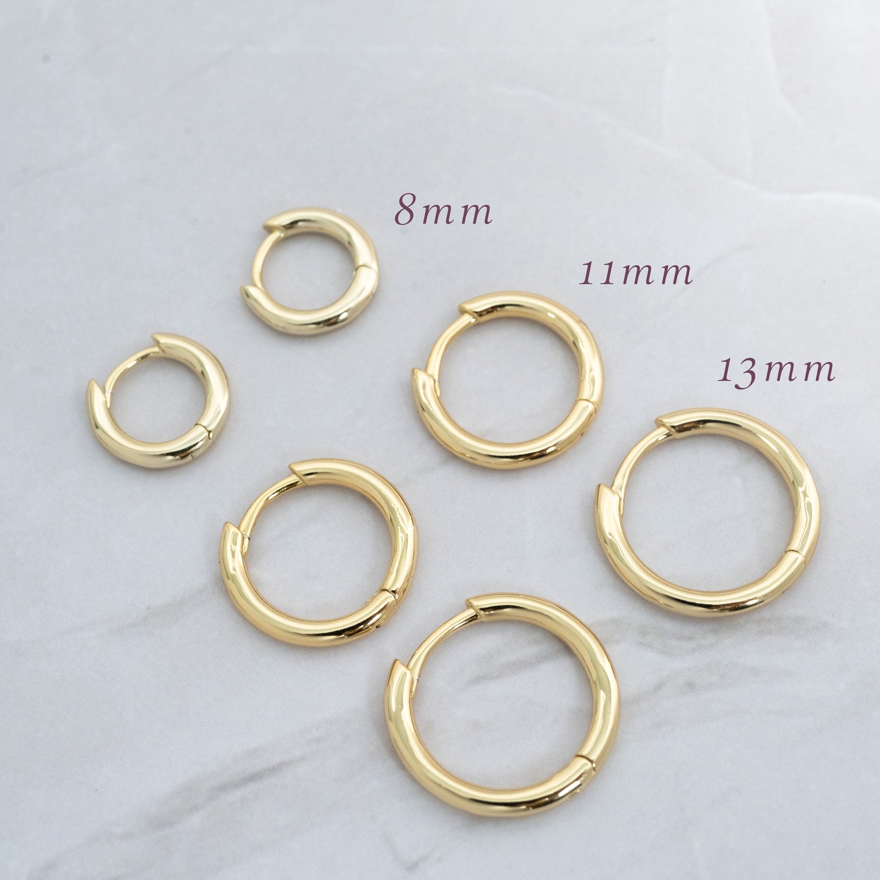 Gold huggie earrings