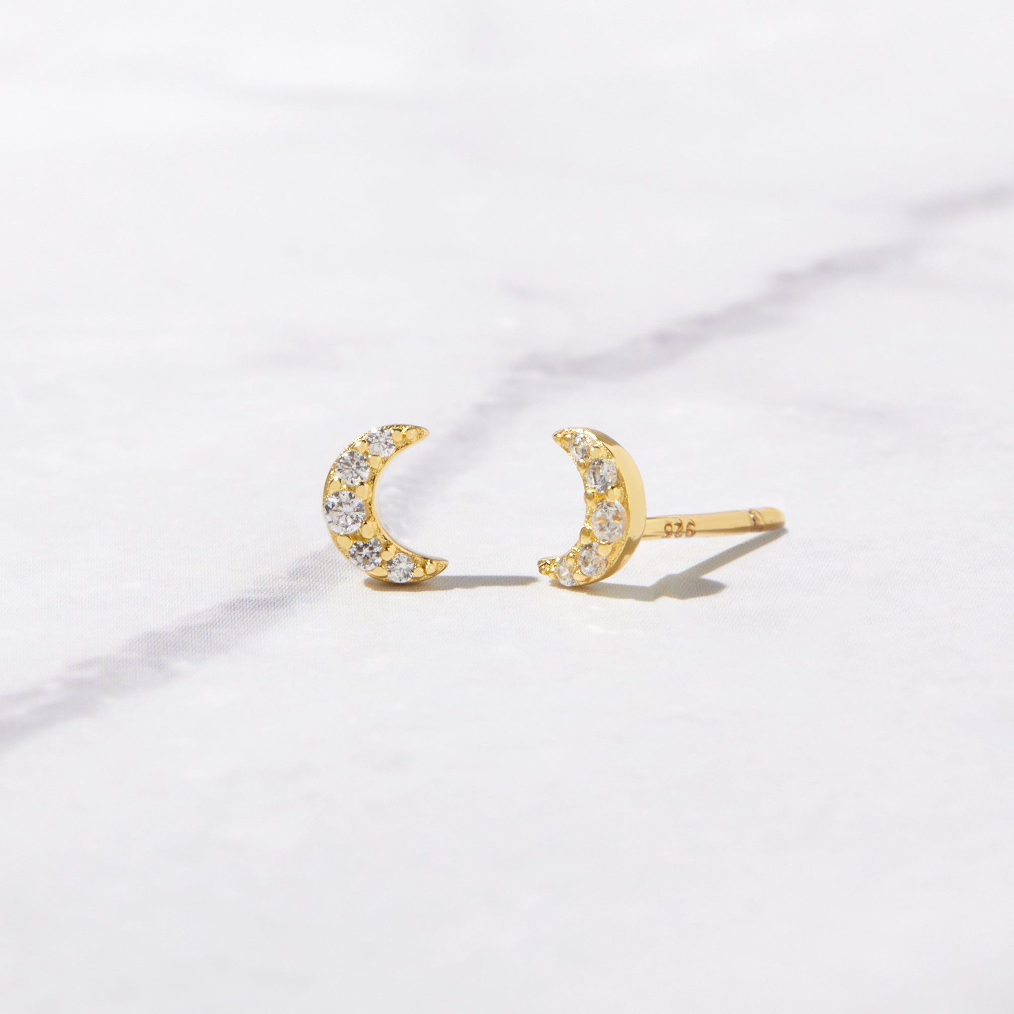 Tiny moon stud on sale earrings