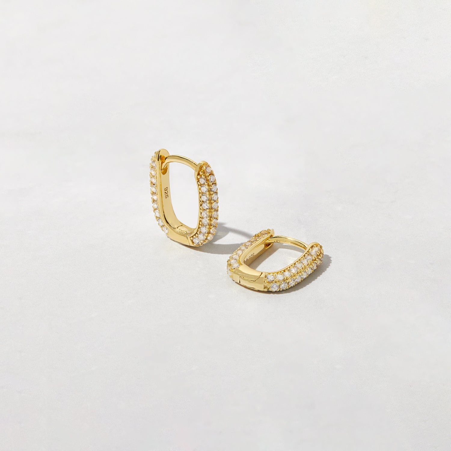 Oval Pavé Huggies