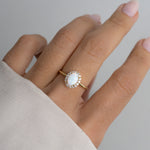 closeup image of cz oval opal ring 