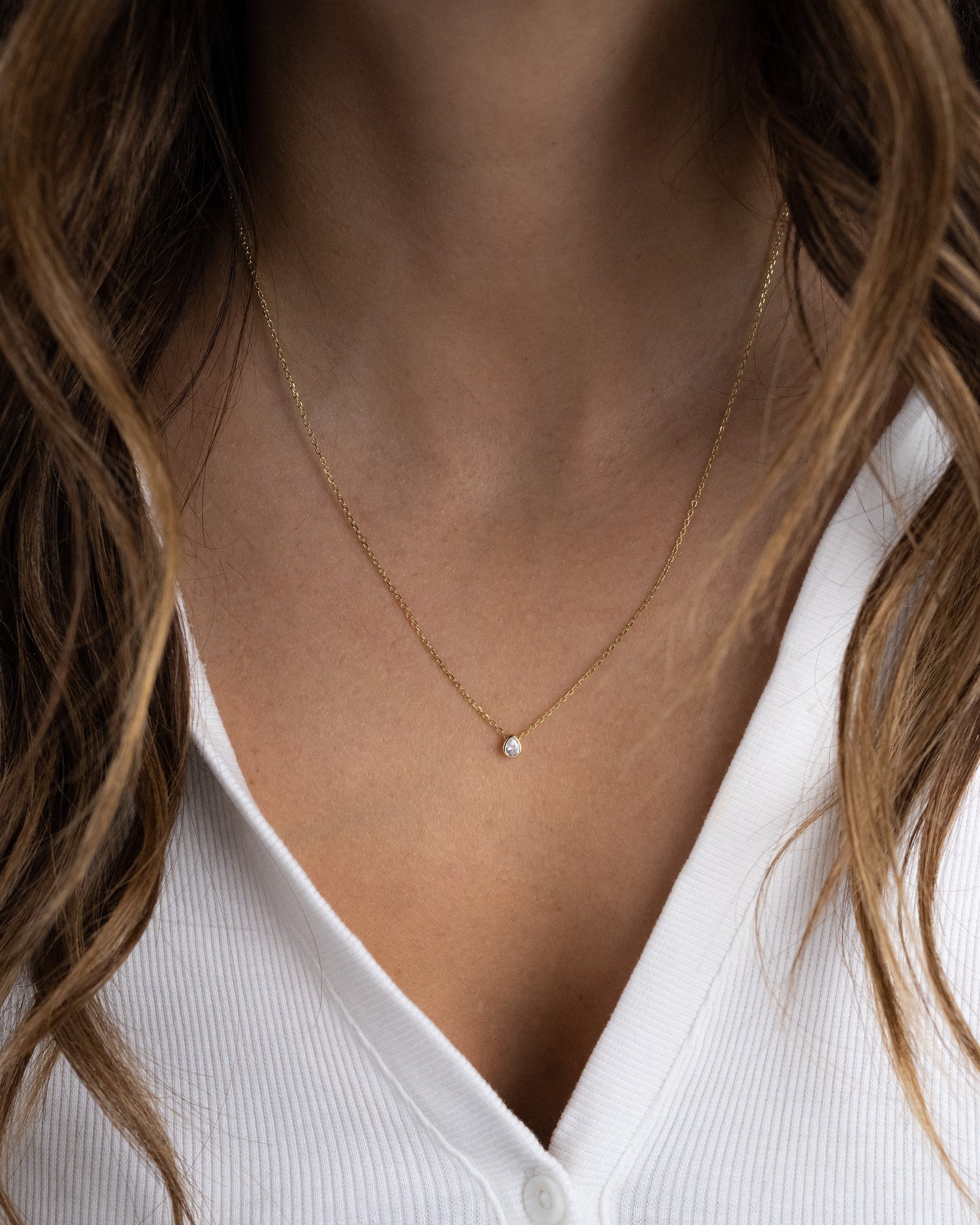 Sami Jewels tear drop pendant necklace featuring a pear-shaped gemstone on a delicate chain.