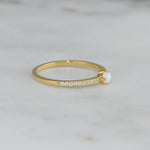 side view of cubic zirconia ring with solitaire opal stone