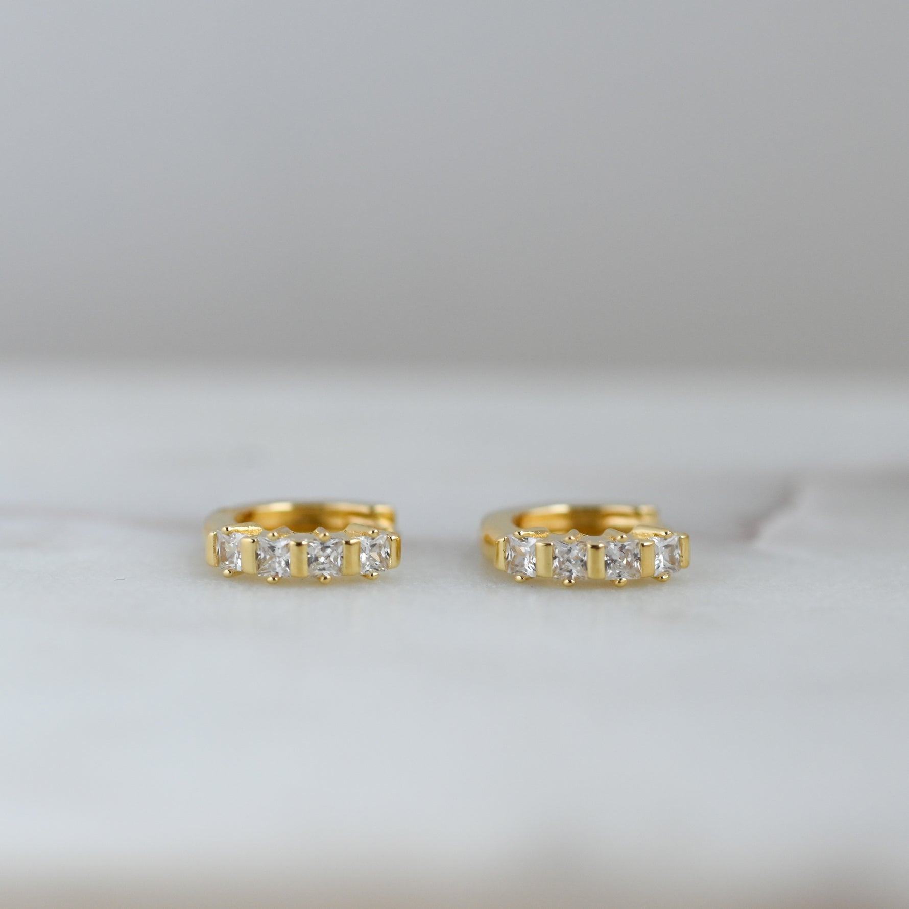 gold cubic zirconia huggie hoop earring