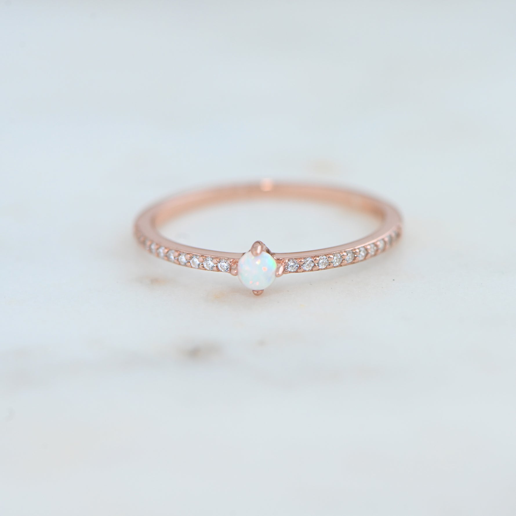 closeup image of rose gold dainty stackable ring