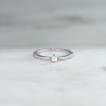 closeup image of silver opal stacking band