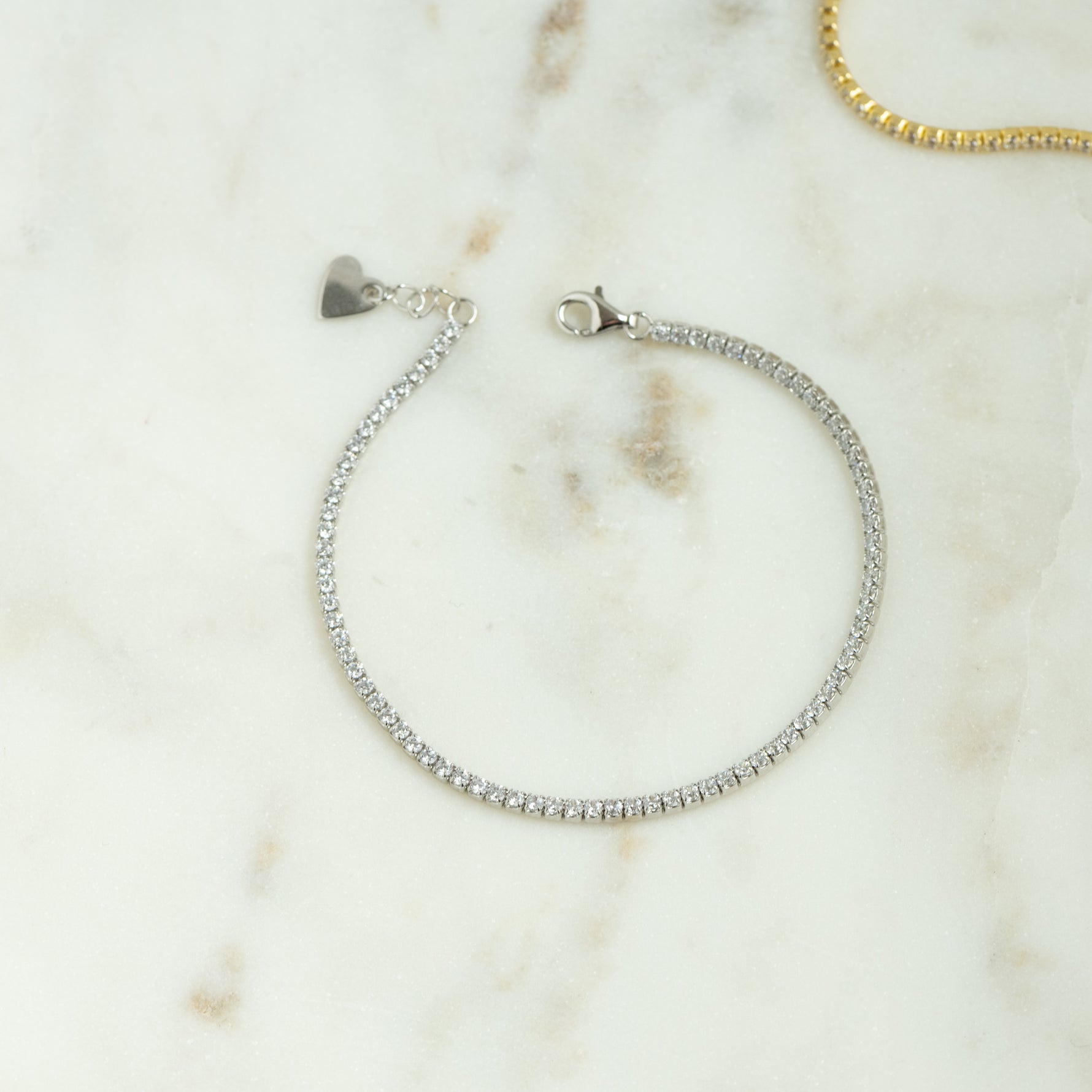 Zoomed-in image of the Silver 1.75mm Tennis Bracelet, showcasing its elegant design and sparkling cubic zirconia stones.